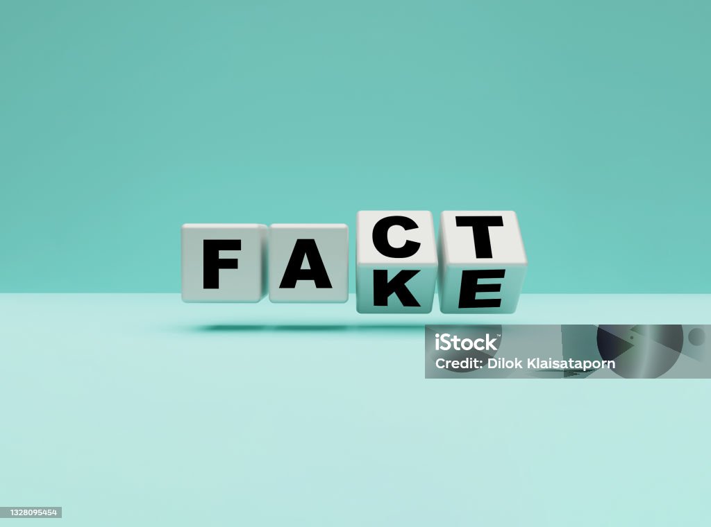 Flipping white cubes for change wording from "fake" to "fact" on blue background , 3d rendering. Fake News Stock Photo