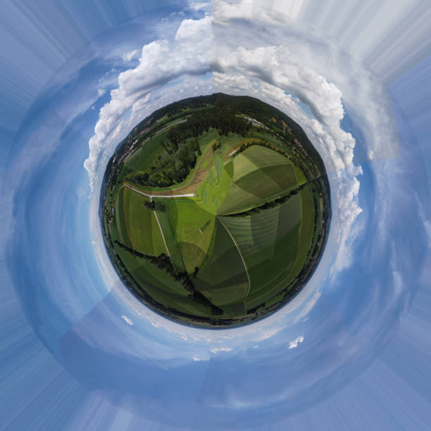 istock Spherical abstract panoramic aerial view in a field with fantastic beautiful clouds and curvature of space like a small planet 1328104627