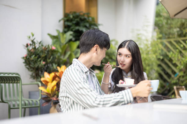 istock Asian couples dating in outdoor cafes 1328105552