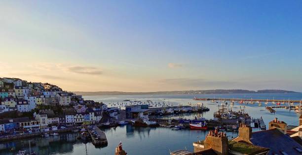 Torbay at dusk Sunset over Torbay, Devon torquay uk stock pictures, royalty-free photos & images