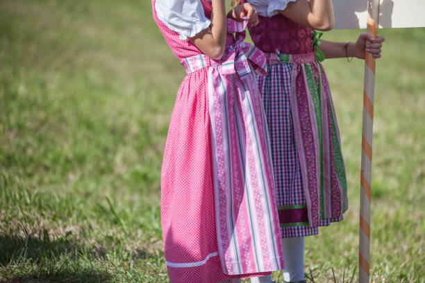 istock Young children in typical costume during an autumn local celebration in Val Isarco ( South Tirol ) 1328116731