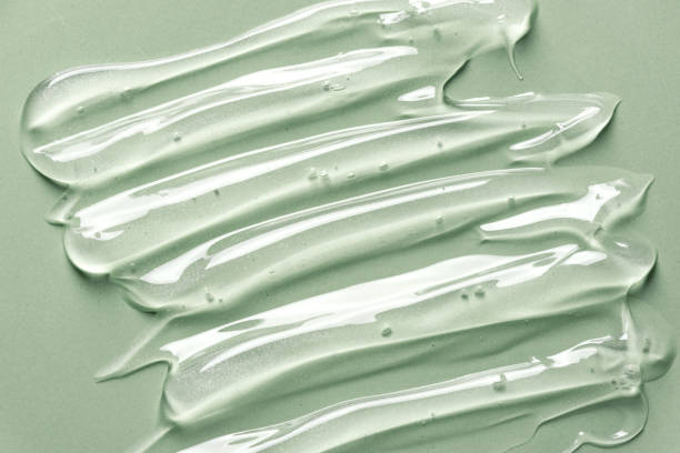istock Cosmetic gel texture on green 1328120126