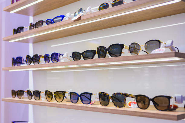 istock Storefront shelves of various modern sunglasses 1328121623