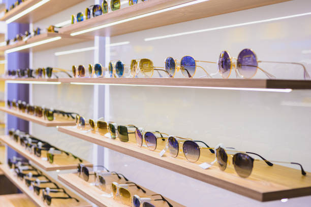 istock Storefront shelves of various modern sunglasses 1328121807