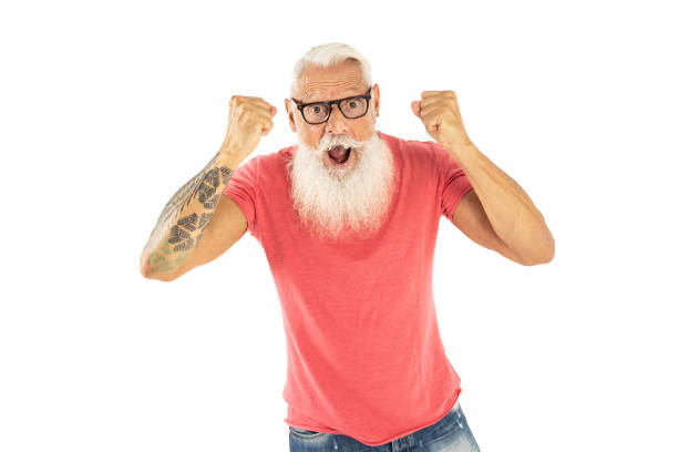 Happy modern bearded man posing in studio. Real people emotions and lifestyle.