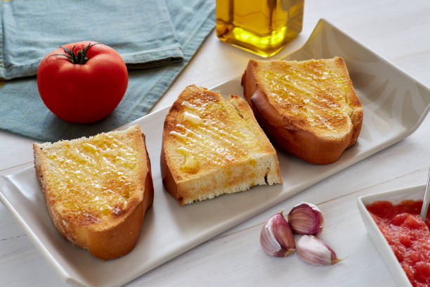 Mediterranean breakfast, spanish breakfast, toast whith olive oil and tomato stock photo