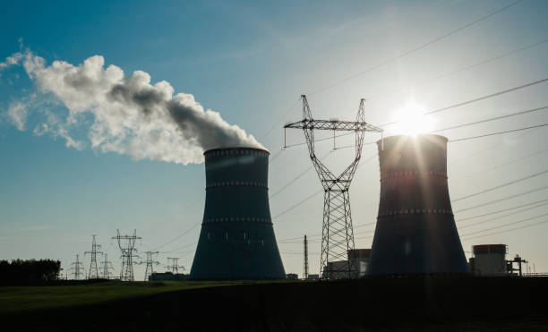 istock nuclear power plant in a sunny landscape 1328124829