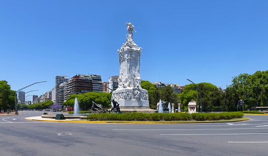 Buenos Aires, Argentina, November 20, 2019: Roundabout on the intersection of Sarmiento and del Libertador streets with fountain and the the Monumento de los Españoles.