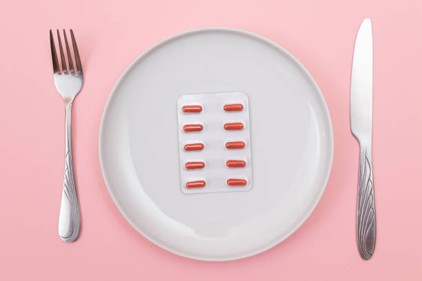 istock Pharmaceutical Industry and Medicinal Products - Pills Package on Plate 1328129648