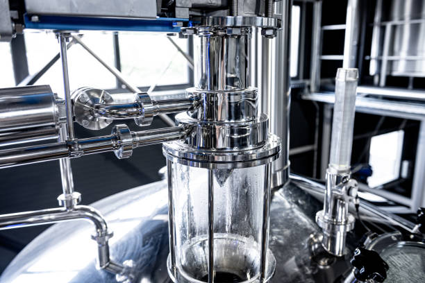 istock Craft beer brewing equipment in privat brewery 1328130112
