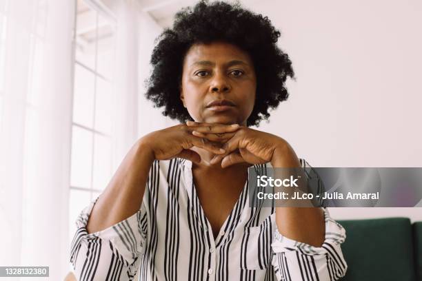 Mature Woman Looking Serious Stock Photo - Download Image Now - Women, One Woman Only, Serious