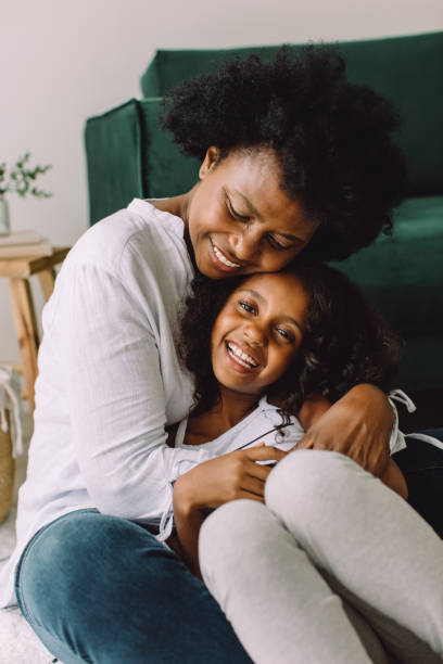 istock Affectionate grandma and granddaughter at home 1328132381