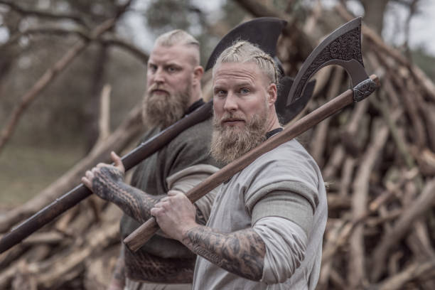 istock Two viking warriors in an autumnal forest 1328134202