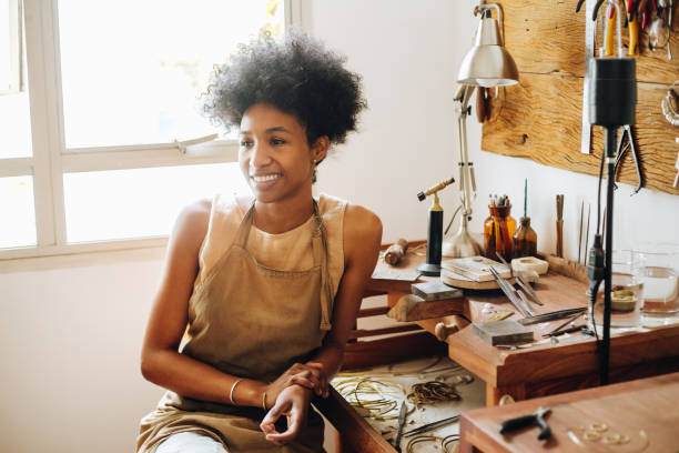 istock Woman sitting in ornament workshop 1328134209