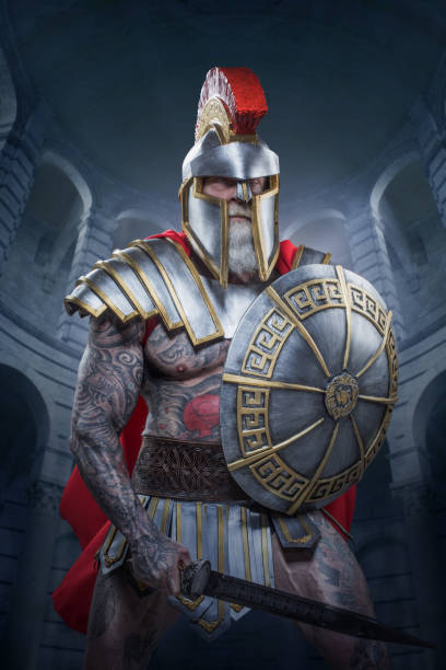 istock A senior bearded Warrior Gladiator holding a weapon 1328135153