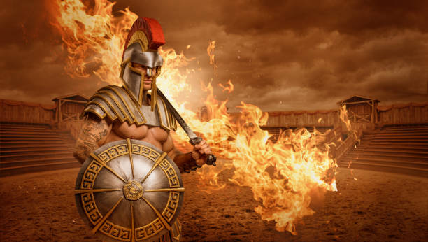 A redhead Warrior Gladiator in a fire filled fighting arena A modern, superhero, comic book re-interpretation of a redhead Warrior Gladiator in a fire filled fighting arena warrior person stock pictures, royalty-free photos & images