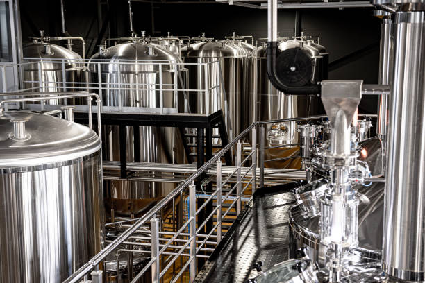 istock Craft beer brewing equipment in privat brewery 1328135900
