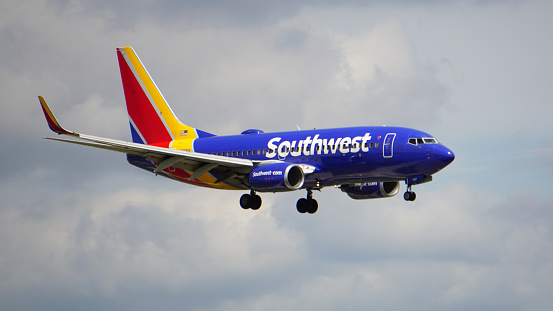Chicago, IL, USA. Southwest Airlines Boeing 737 prepares for landing at Chicago O'Hare International Airport.