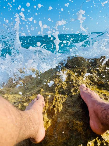 istock sitting by the sea 1328139939