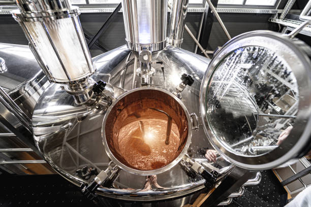 istock Craft beer brewing equipment in privat brewery 1328140329