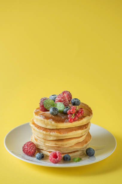 istock American pancake on a yellow background 1328142418