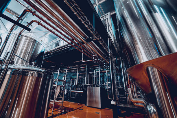 istock Pipes and fittings at a craft modern brewery 1328143076