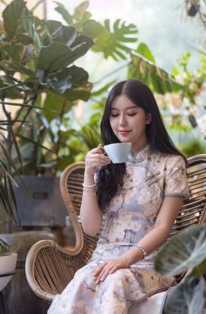istock A woman drinking coffee on the balcony 1328143842