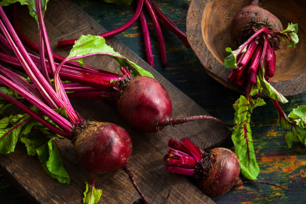 istock Fresh organic beetroot with green leaves 1328144352