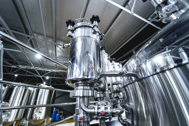 istock Craft beer brewing equipment in privat brewery 1328145577