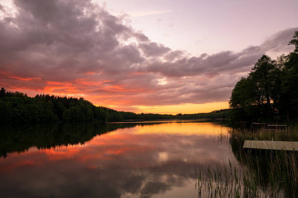 istock Spectacular and colorful sunset over lake 1328146039