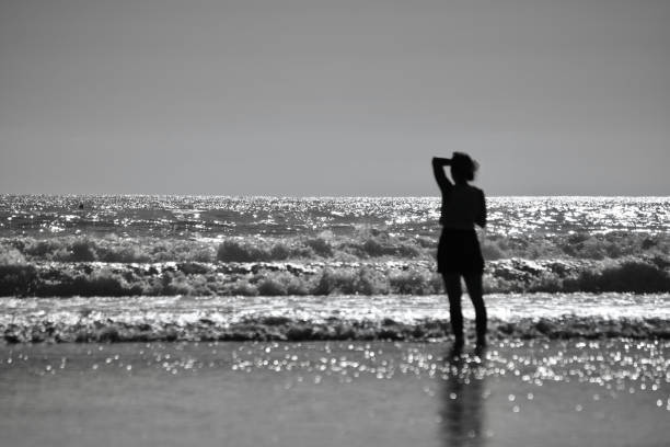 istock Surfers enjoy the spacious beaches on the Gower Peninsula 1328146854