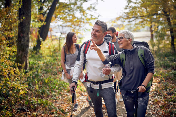 istock An elderly couple at hiking exploring beautiful sight 1328149202