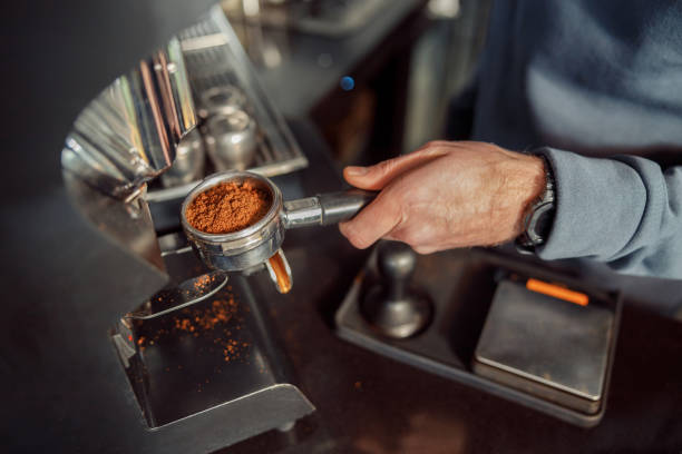 istock Happy smiling professional barista in cafe 1328152568