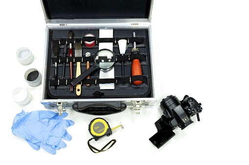Top view of a scientific police briefcase, CSI with everything needed for a criminal investigation