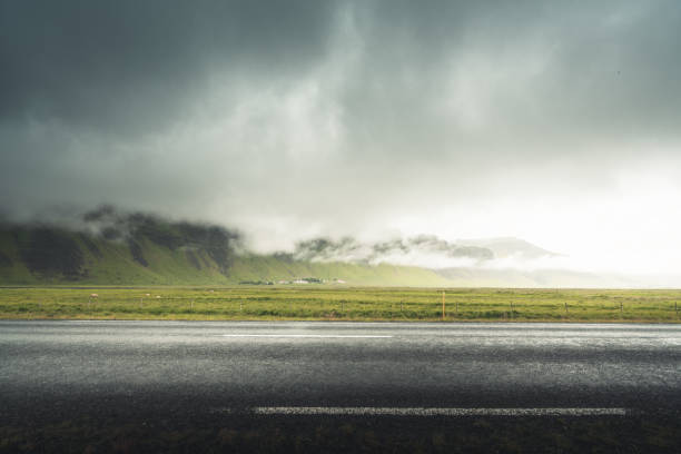 istock Icelandic landscape with asphalt road 1328153762