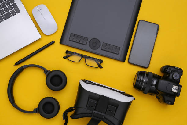 istock Modern work and entertainment gadgets on a yellow background. Top view. Flat lay 1328156667