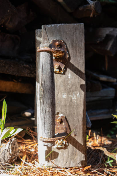 istock Old gray wooden doorknob 1328162807