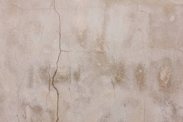 istock Old concrete white-cream-brown wall textures for background with cracks textures 1328164177