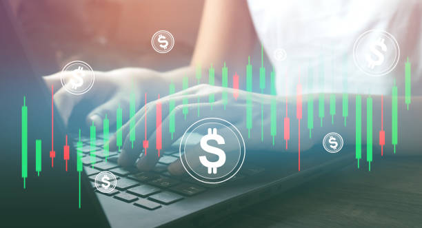 istock person working exchange at modern office.technical price graph and indicator, red and green candlestick chart and stock trading and bitcoin computer screen background 1328165779