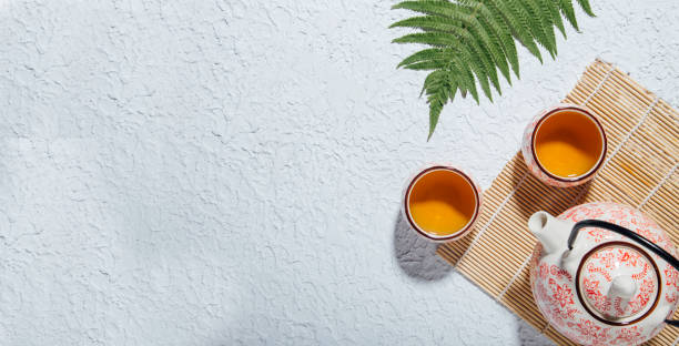 istock top view of tea and tea set on concrete background 1328174001