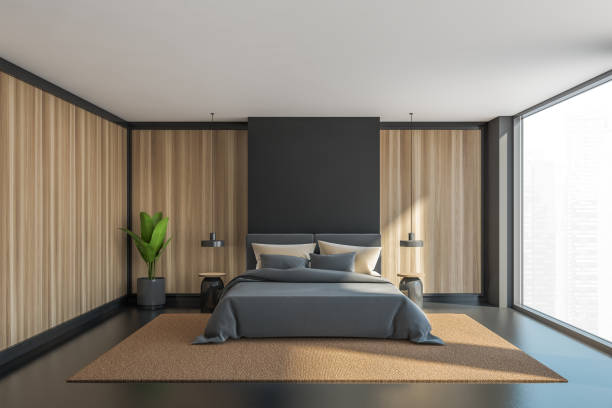 istock Wooden and grey panoramic master bedroom interior 1328177008