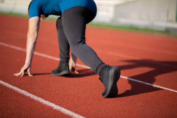 istock Sporty man ready to run 1328178070