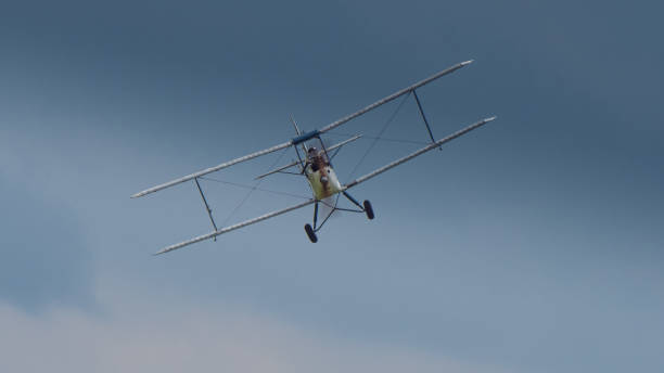 istock A vintage classic Biplane aircraft in flight 1328178700