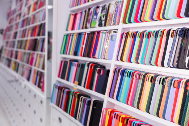 istock Smartphones on display shelves in an electronics store 1328179866