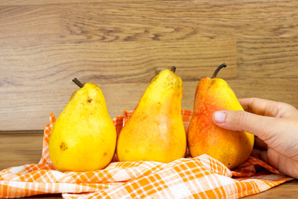 Directly above view of a basket of pears.