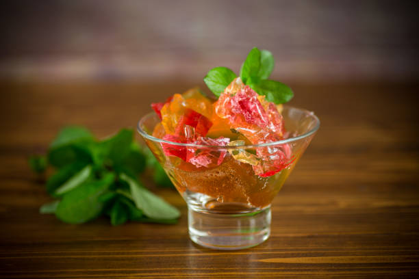 istock colored sweet fruit jelly in a glass glass 1328181837