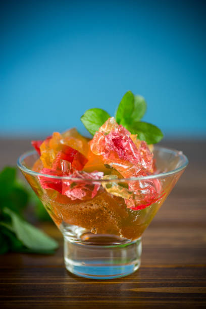istock colored sweet fruit jelly in a glass glass 1328181852