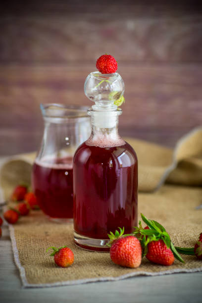 istock sweet cooked strawberry syrup in a glass decanter 1328182599