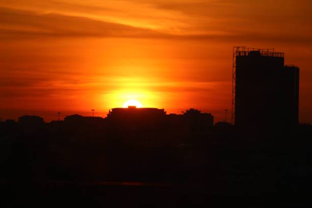 istock Colorful sunset with building silhouettes in Lisbon 1328183038