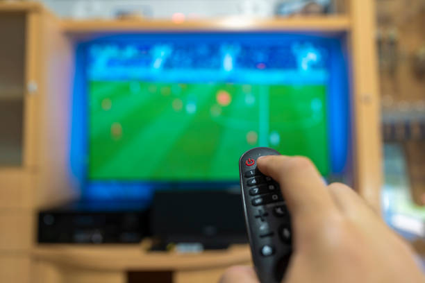 istock Viewing football on TV. 1328183484